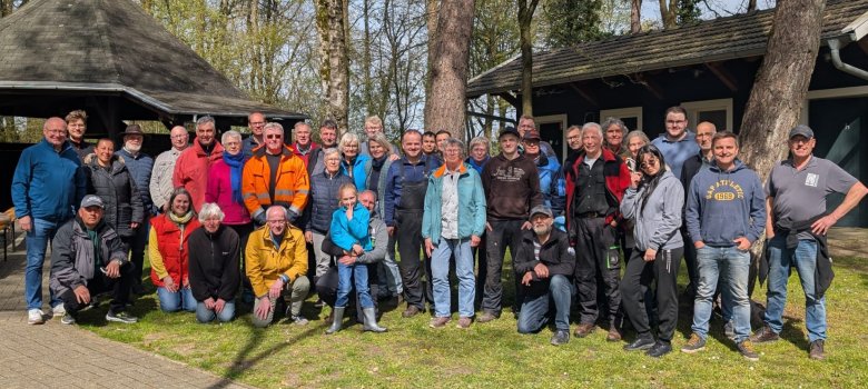 Group photo of all helpers at the barbecue area