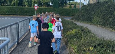 Group of children goes for a walk